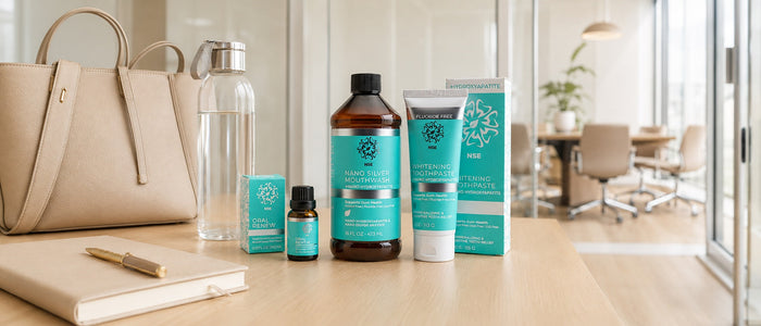 Fresh breath oral care products and water bottle on an office desk